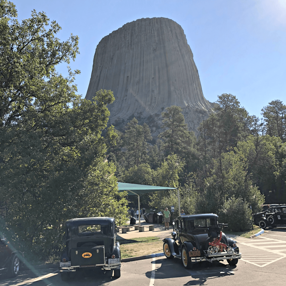 Model As in front of tower